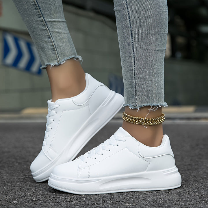 Saubere weiße Ledersneaker für Damen