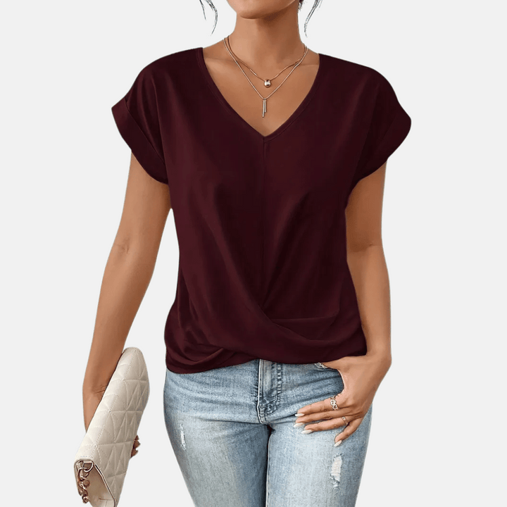 Damenbluse mit V-Ausschnitt und drapiertem Saum