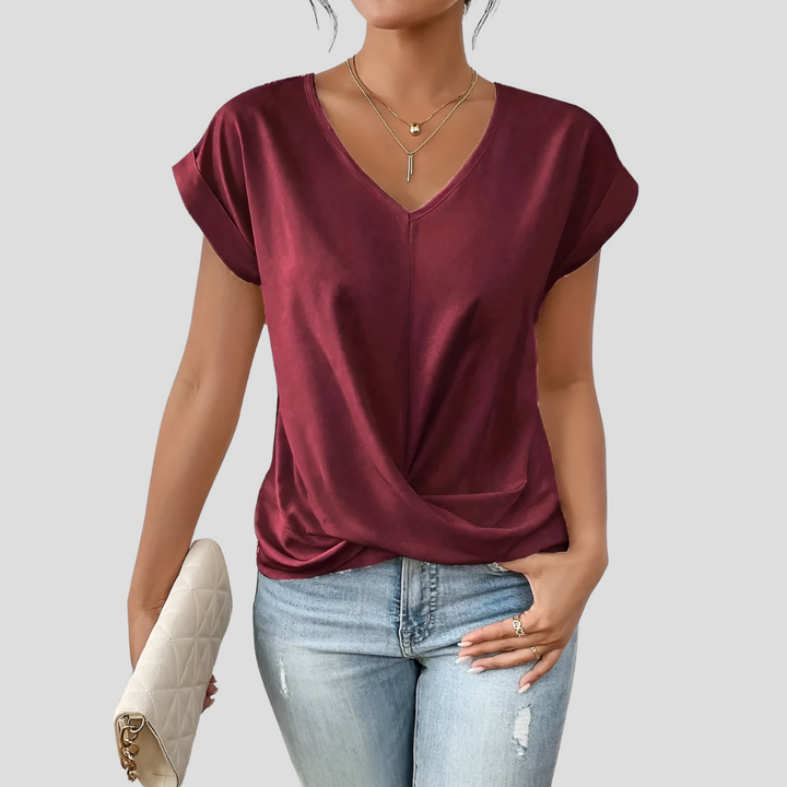 Damenbluse mit V-Ausschnitt und drapiertem Saum