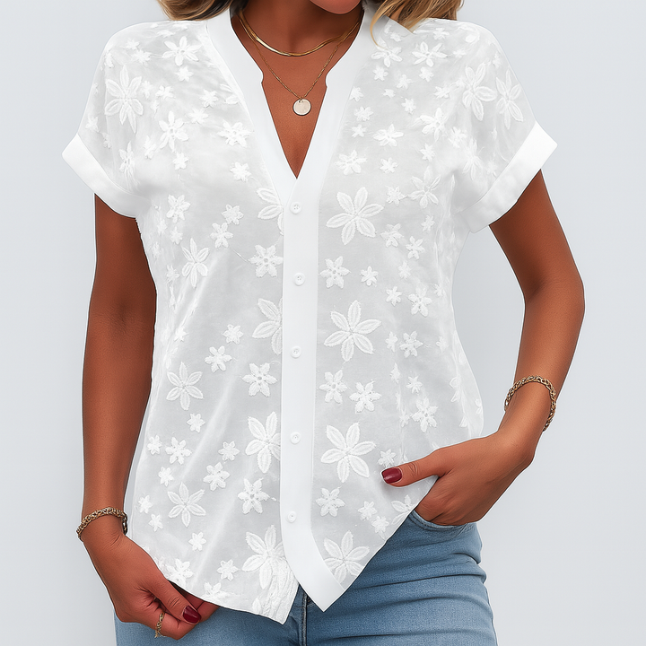 Damenbluse mit kurzen Ärmeln und Blumenmuster