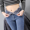 Winterjeans für Damen mit hoher Taille, gefüttert für kalte Tage